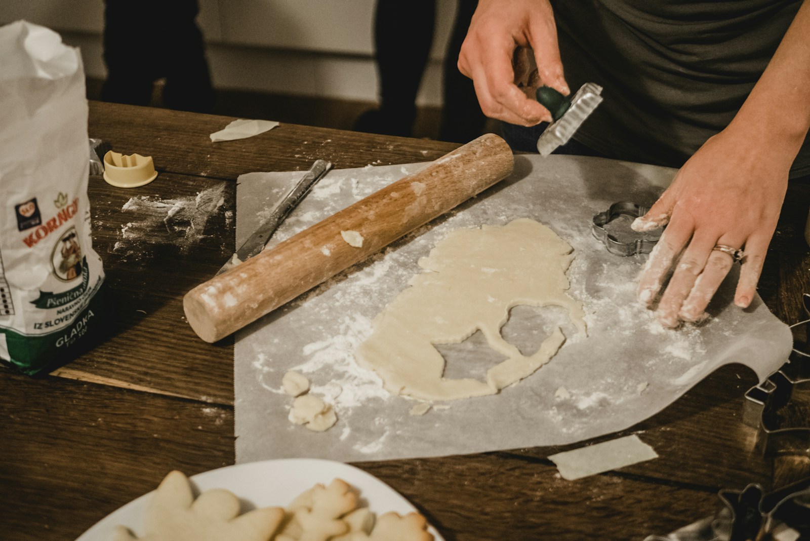 man baked cookies with designs